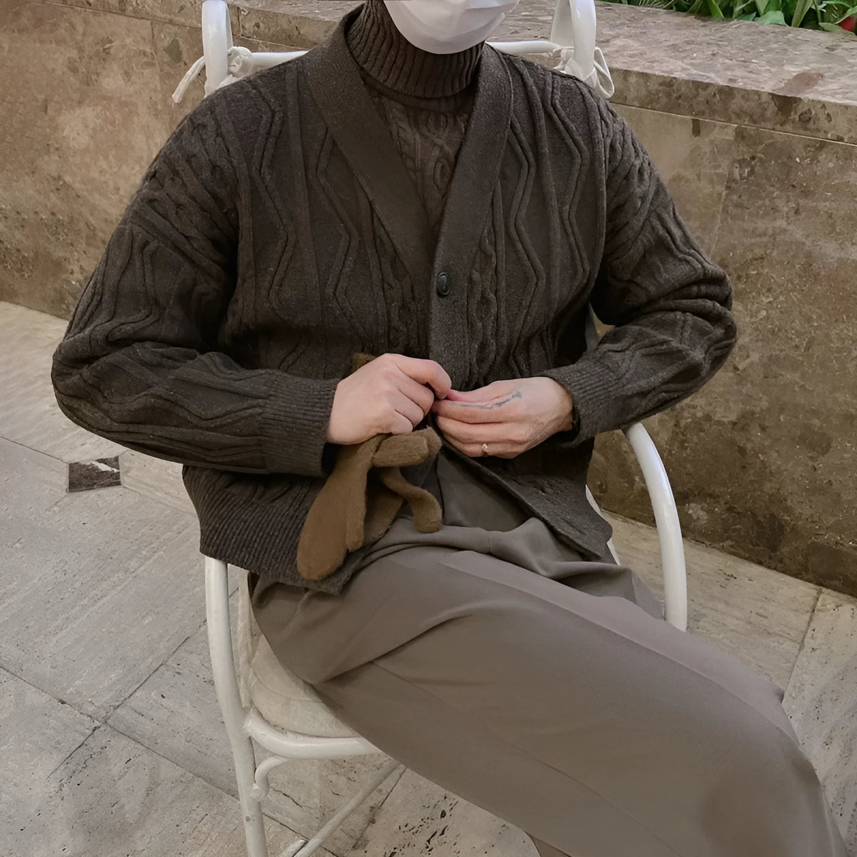 Coffee brown loose fit cardigan sweater coat with long sleeves and thickened acrylic fabric on a model