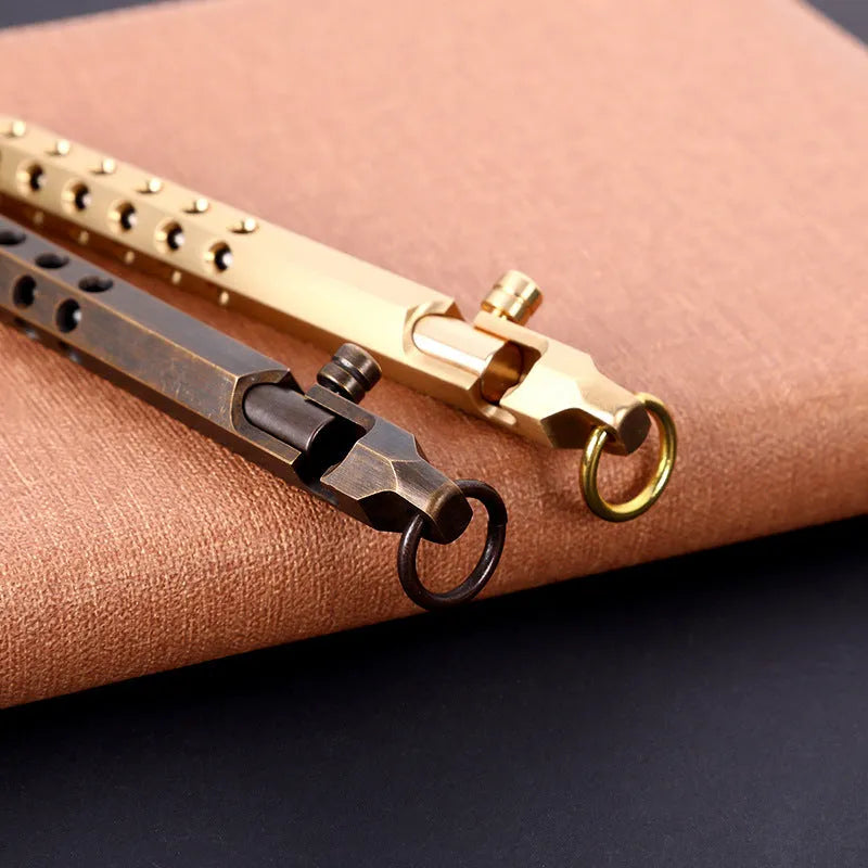 Retro brass hexagon bolt action pen with rollerball refill showing hexagonal barrel detail