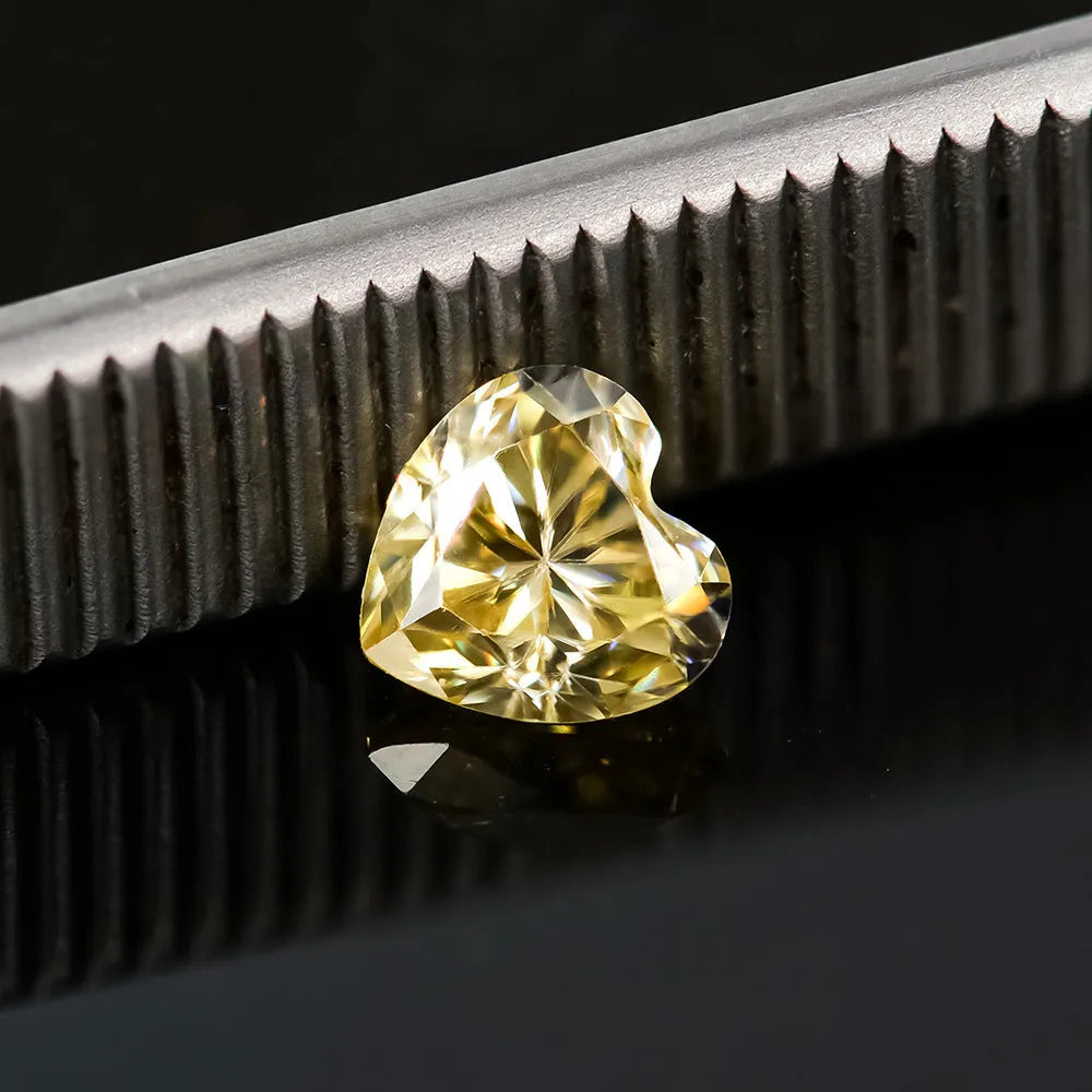 Lemon yellow heart-shaped moissanite gemstone showing precise cut and dimensions