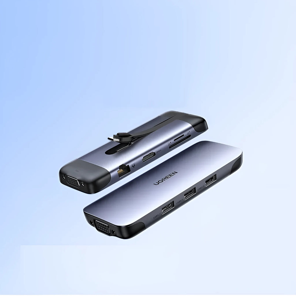 USB-C to multi-port docking station adapter with short cable shown next to a laptop, displaying HDMI, USB, and charging ports.