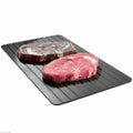 Black aluminium fast defrost tray for thawing frozen meat and food without electricity.