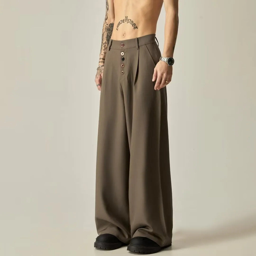 Men's black wide-leg casual trousers with vertical stripes and an elastic waistband.