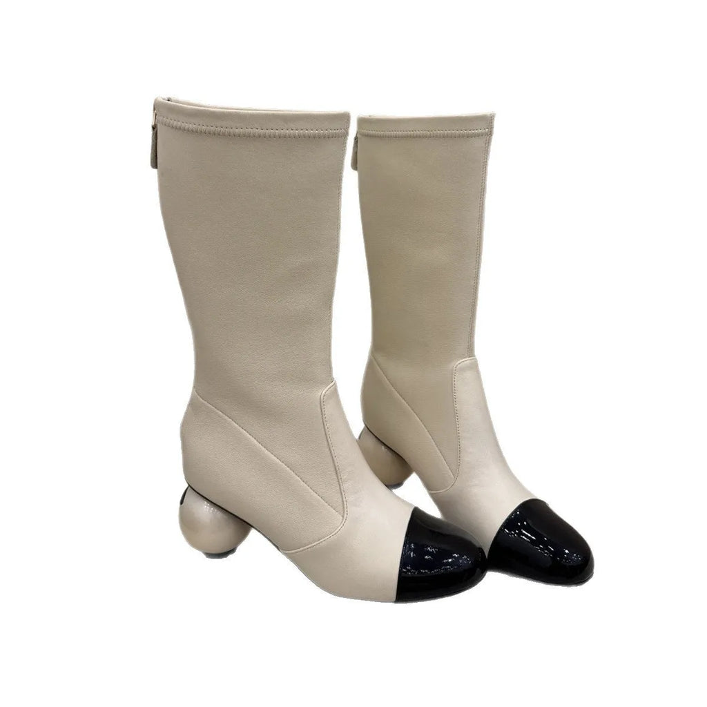 Women's chunky heel ankle boots with elastic fabric upper in black, white, and apricot side view