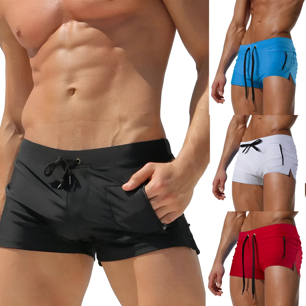 Men's black high waist swimming trunks with a lace-up front closure on a solid colour background.
