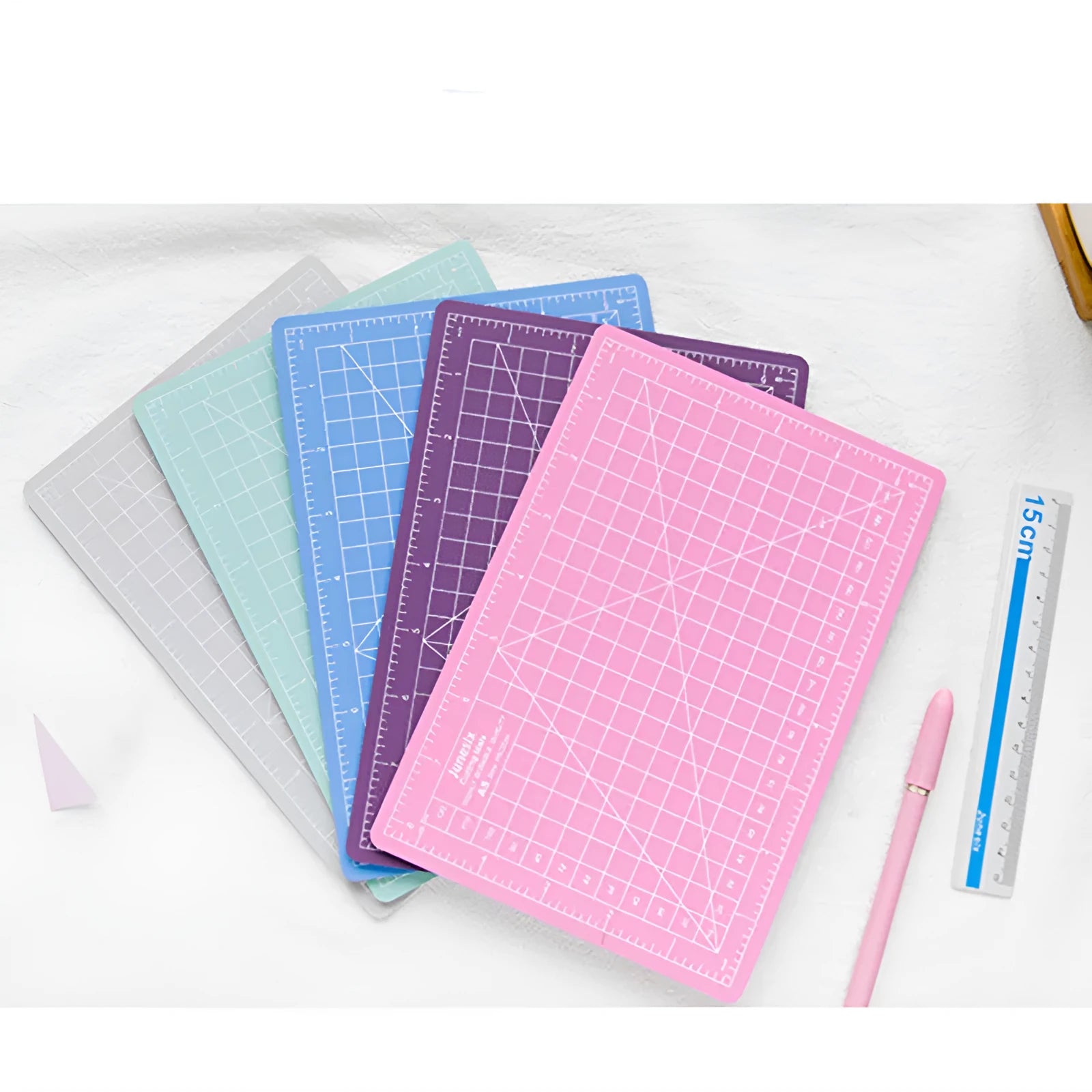 Art pen knife cutting board set with backing board, ruler, sharpener, and blade in blue colour