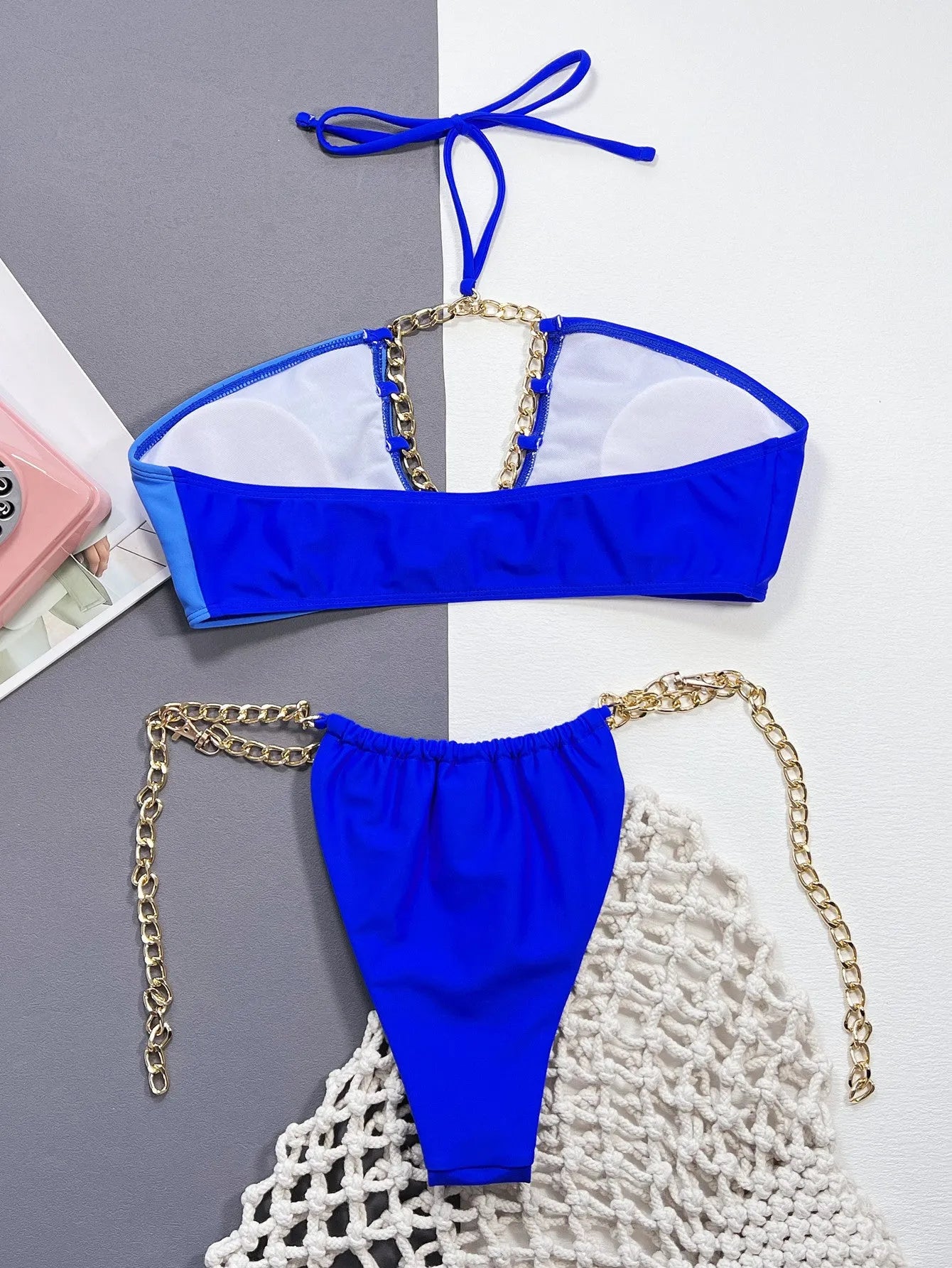 Blue solid colour women's bikini set with nylon fabric split top and bottom on model