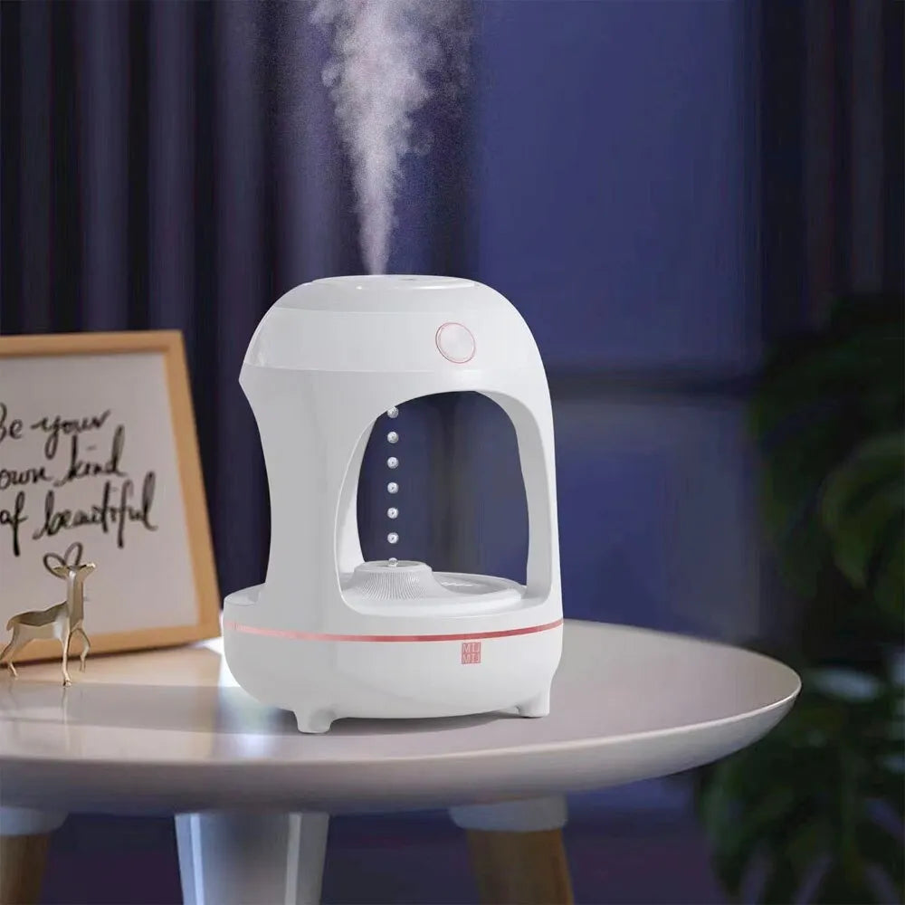 Levitation water drop humidifier with LED night light in rose gold and white colour