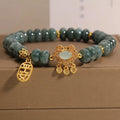 Women's natural emerald jade bracelet with abacus beads and safety lock closure