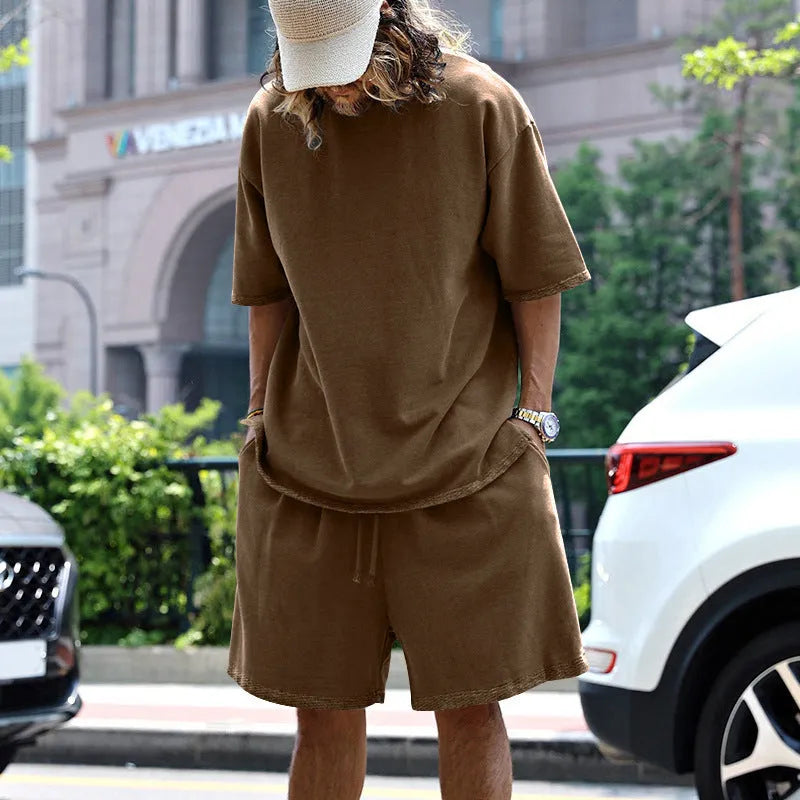 Men's 2-piece loose sports suit set with round neck T-shirt and drawstring shorts in solid colour