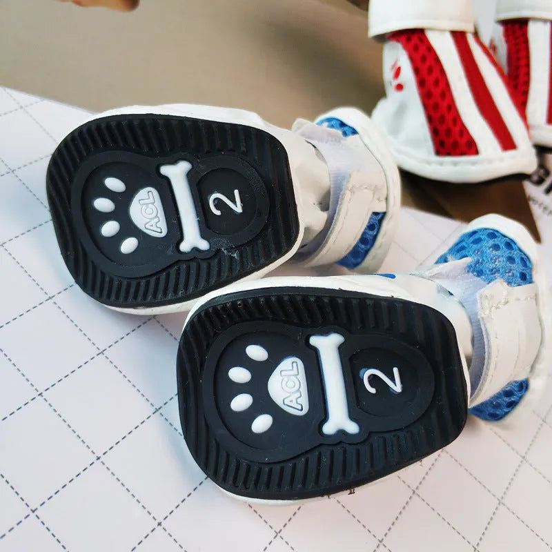 VIP Teddy Schnauzer blue cloth dog shoes with front zipper and non-slip sole, shown as a set of four.