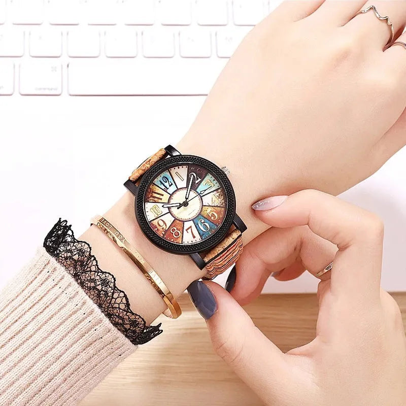 Vintage leather women's quartz watch showing 37mm round dial with tempered glass and stainless steel buckle