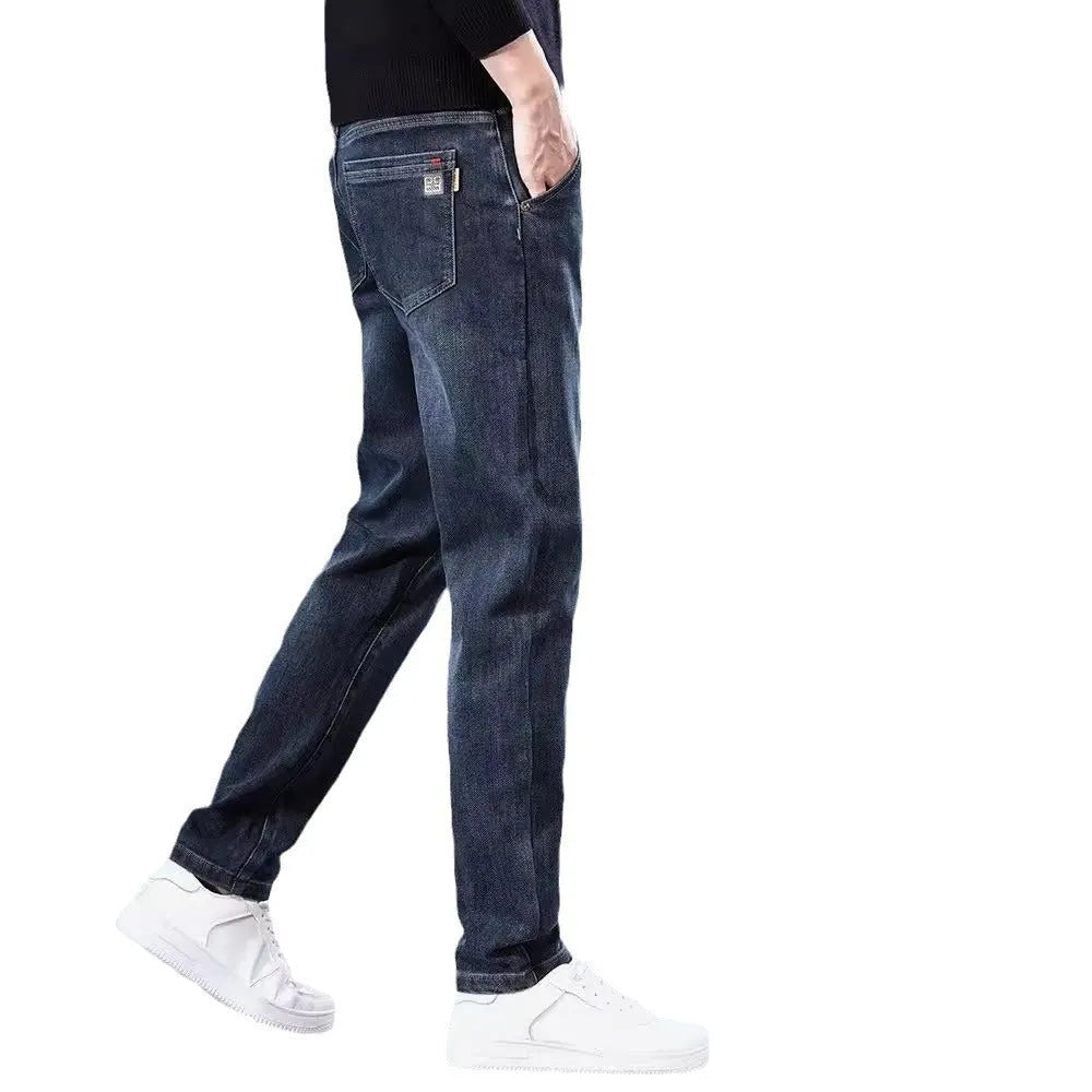 Blue grey slim straight casual trousers with elastic waist and zip fly on hanger