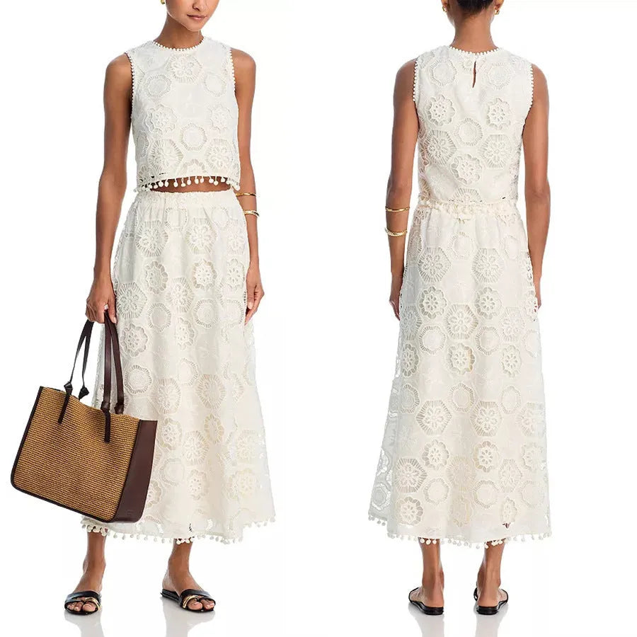 Literary Trends white women's suit with embroidered detail on sleeveless top and long skirt
