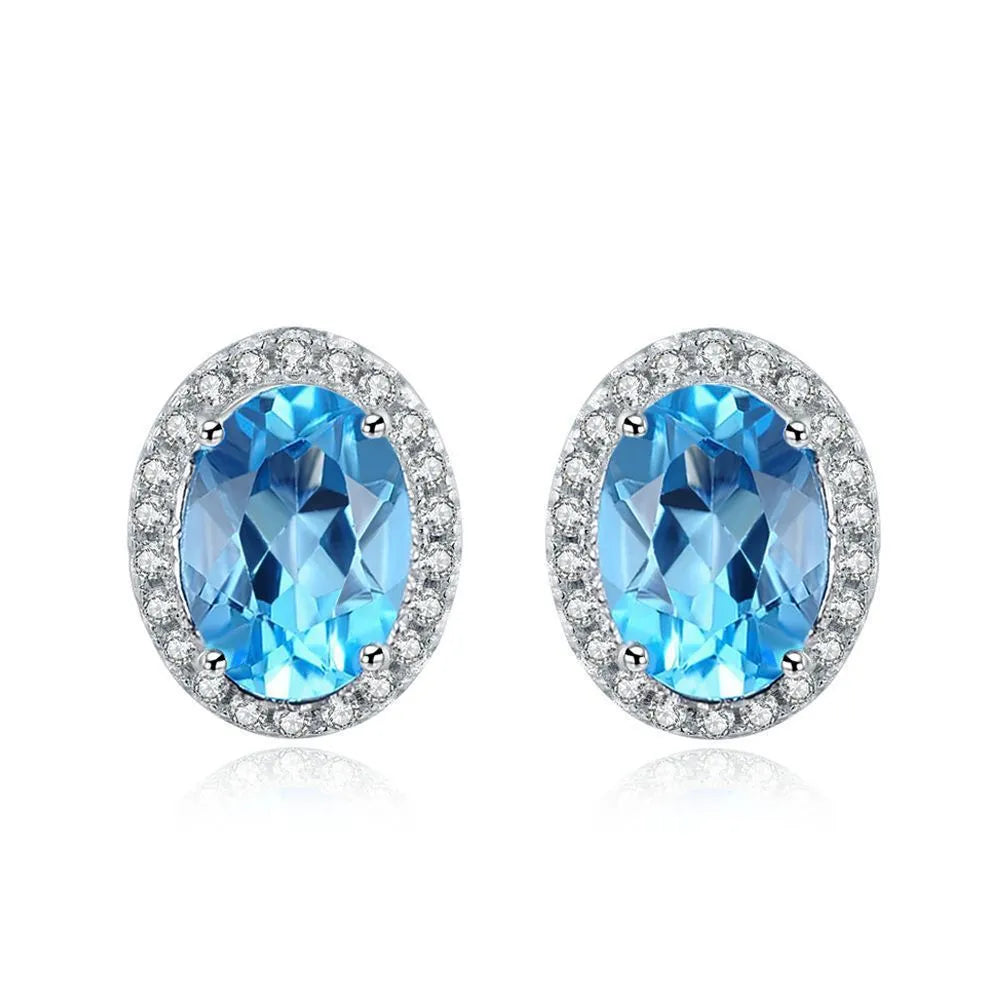 925 sterling silver geometric jewellery set with blue topaz gems including earrings, ring, necklace and pendant