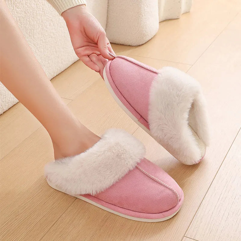 Women's brown plush indoor slippers with a round toe, flat heel, and a textured PVC sole.