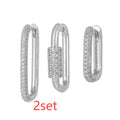 Geometric zircon ear clip set showing three square earrings with quadrilateral and ellipse designs