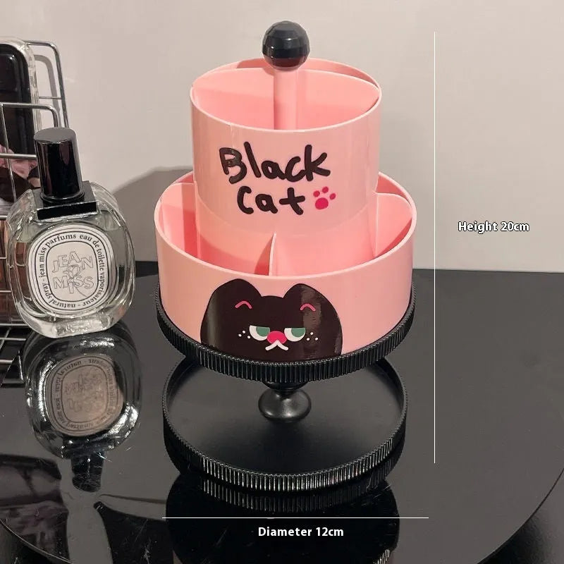 Rotating beige cosmetic brush storage barrel with 18-litre capacity on a table.