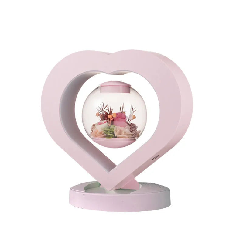 Pink preserved rose decorative ornament with optional base and Bluetooth audio functionality