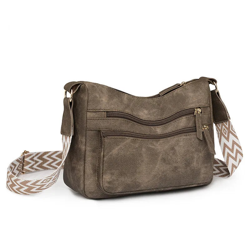 Women's large capacity one shoulder crossbody backpack in soft PU leather with waterproof finish, available in five colours