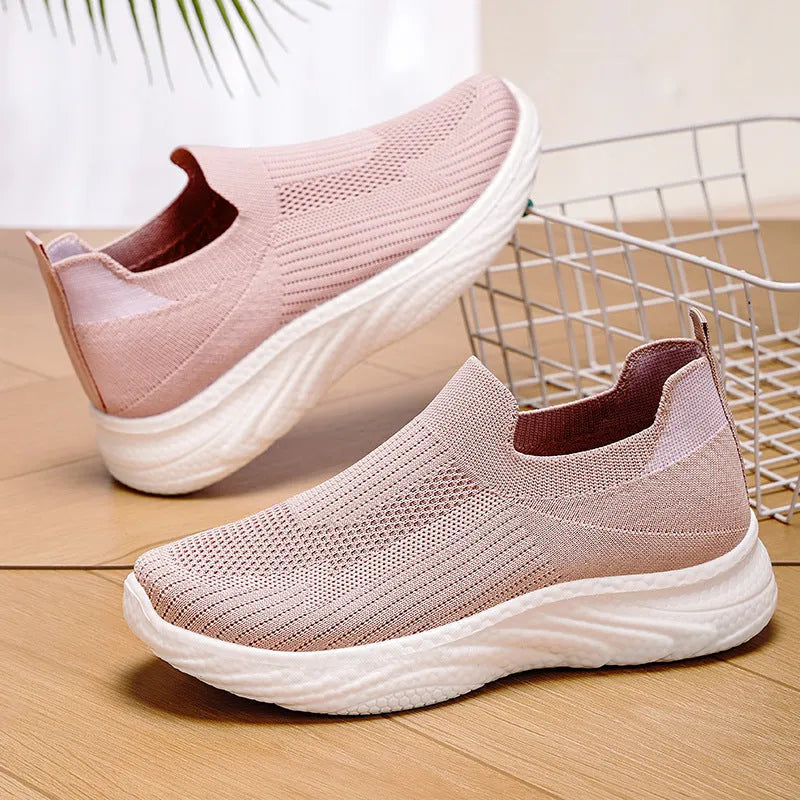 Women's casual running shoes in flyknit with a soft PVC sole, shown in a choice of colours.