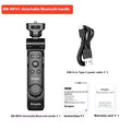 Mobile phone Bluetooth remote control tripod with handle in black ABS material on flat surface