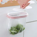 Blue plastic kitchen garbage bag storage rack for organising bin liners inside a cabinet.