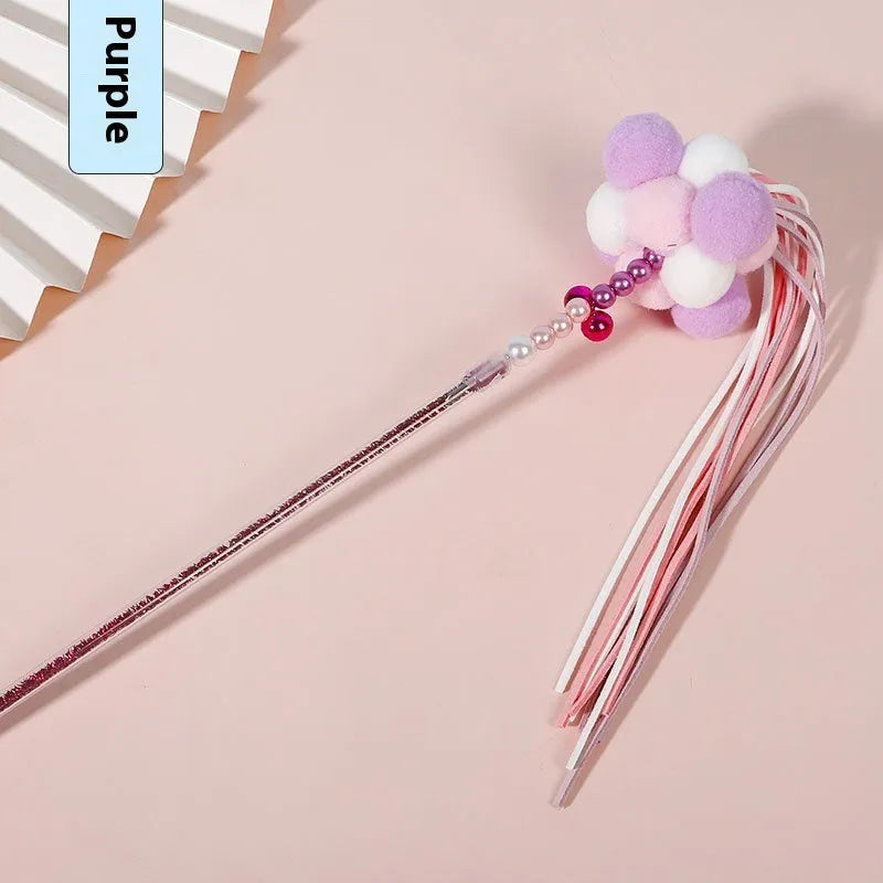 Acrylic cat fairy rod toy with colourful stripes, blue colour option, on white background