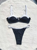 Black low waist women's bikini swimsuit with stitching split detail on the briefs.