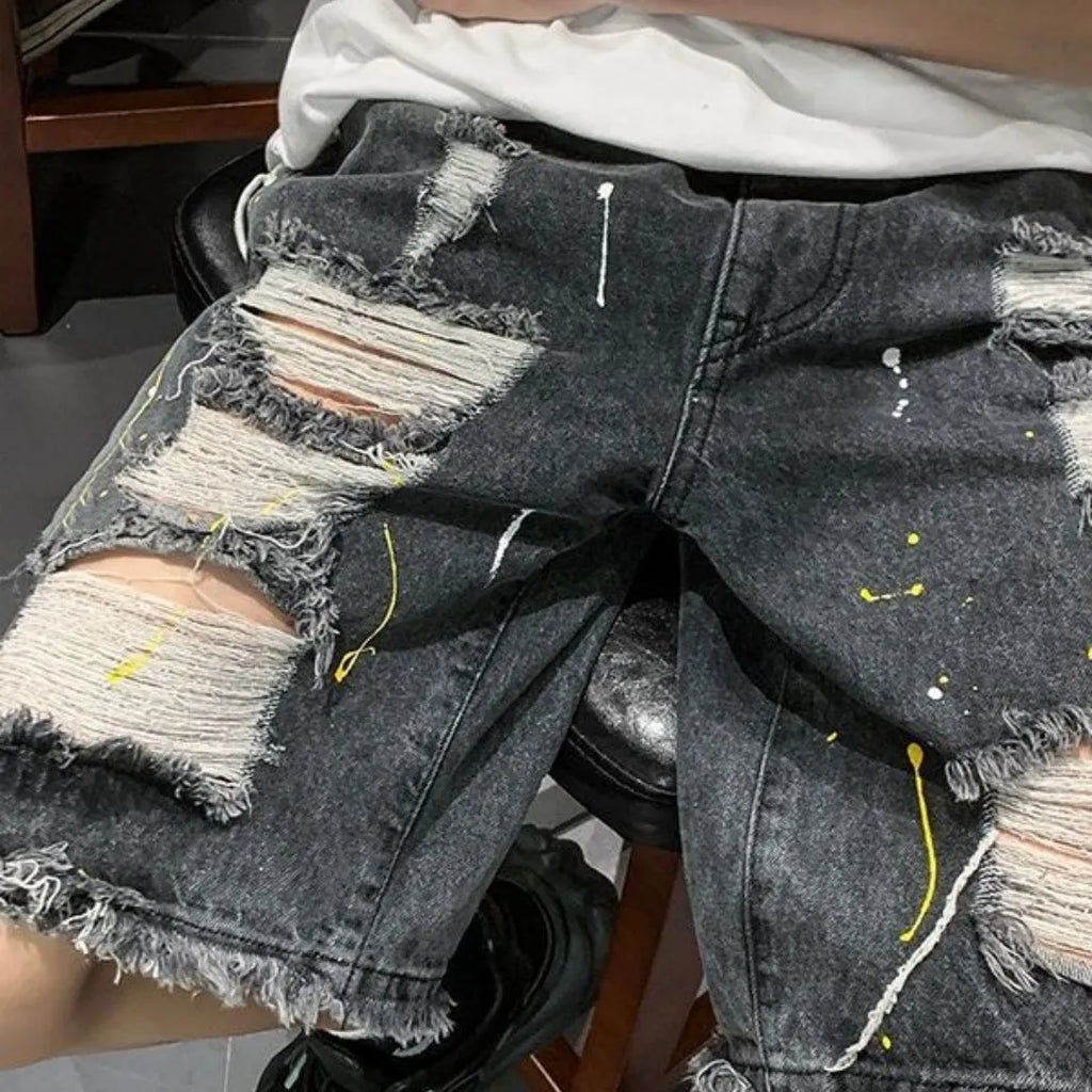 Men's black water washed hole denim shorts with loose street style fit