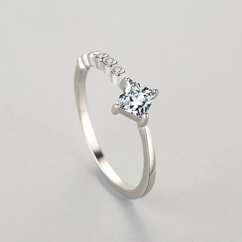 Sterling silver geometric ring with gold-plated inlaid gems, adjustable US sizes 5-9, silver colour