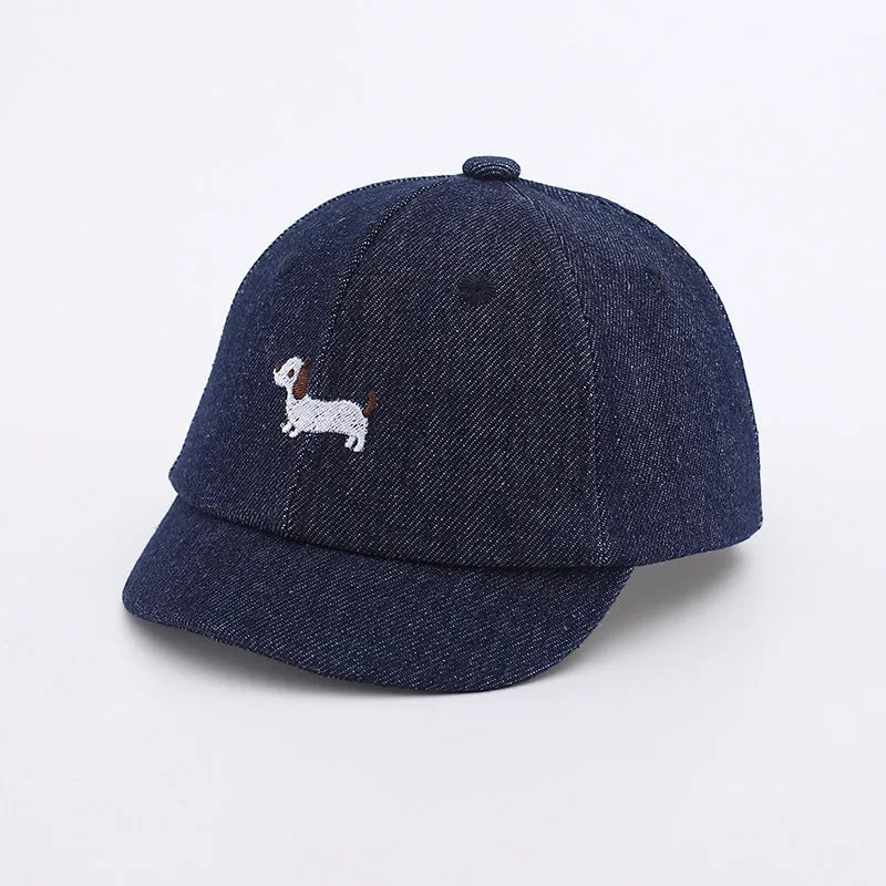 Denim puppy print baseball cap for babies with dome crown and short brim in black, dark blue, or light blue