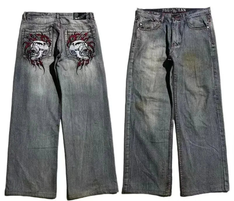 Grey washed wide-leg jeans with straight-leg workwear styling and mid-waist zip fly
