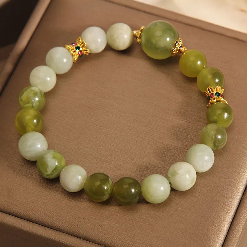 Xiuyan jade women's bracelet in jade green colour with original design.
