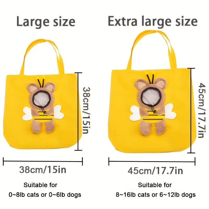 Blue canvas pet carrier shoulder bag with an open side showing a cat's head, featuring safety zippers and an animal print design.