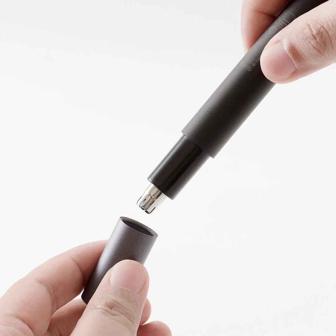 White HN3 electric nose hair trimmer on table with 420J2 steel cutter head