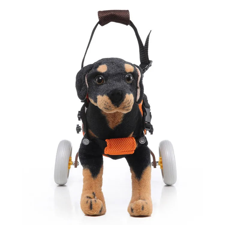 Grey dog wheelchair with adjustable frame, two wheels, and carrying handle on a light background