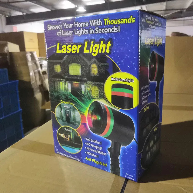 Gypsophila USB laser light Christmas lawn lamp with IP44 waterproof housing, showing red and green laser projection on garden grass at night