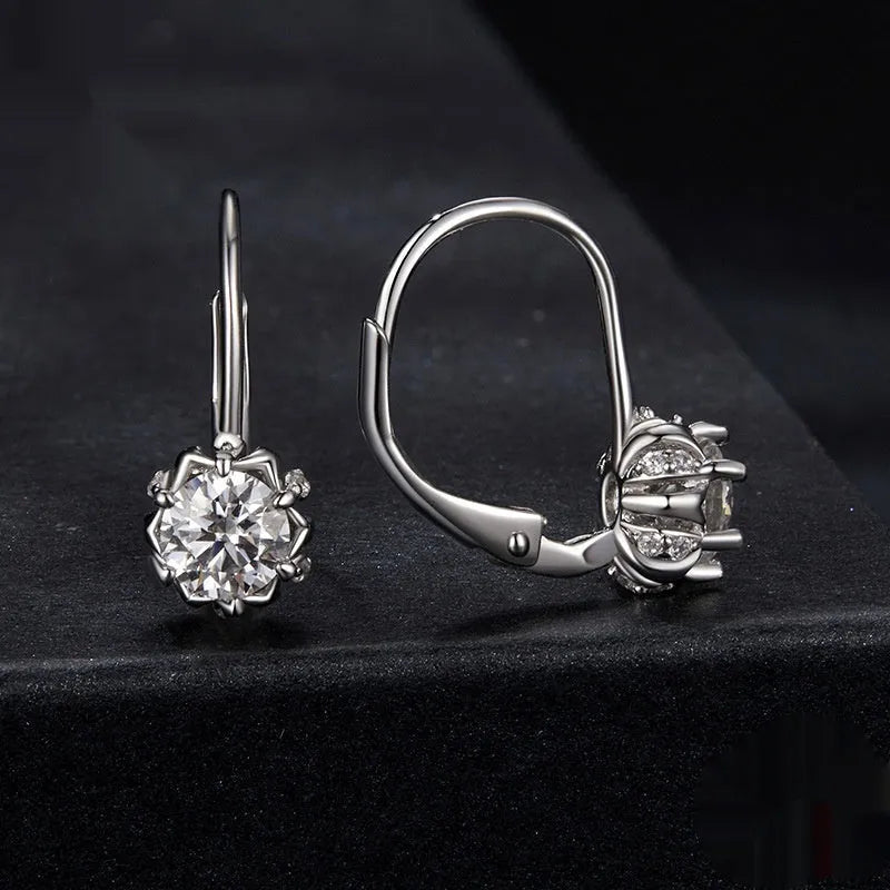 Sterling silver flower bud ear clip with moissanite stone and white gold plating