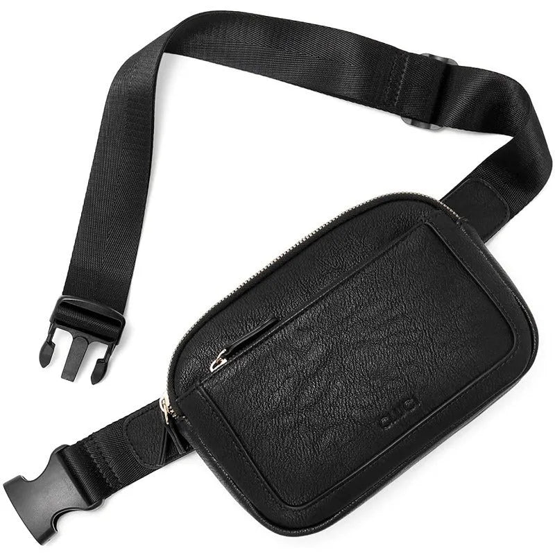 Women's PU leather chest bag in black colour, worn as a crossbody bag with adjustable strap