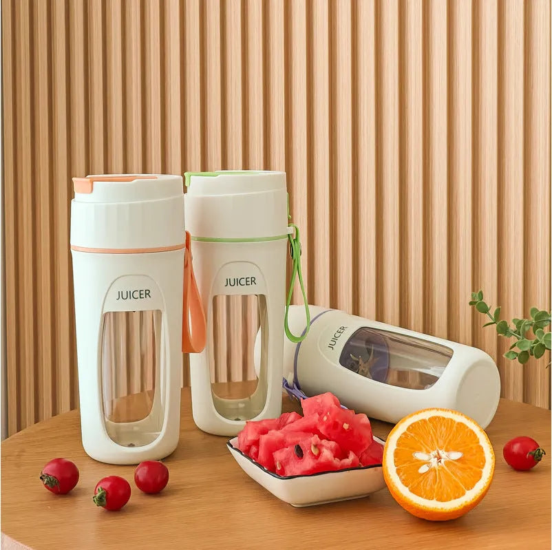 Portable electric juicer cup with USB cable in fresh orange, grass green, or light purple colour.