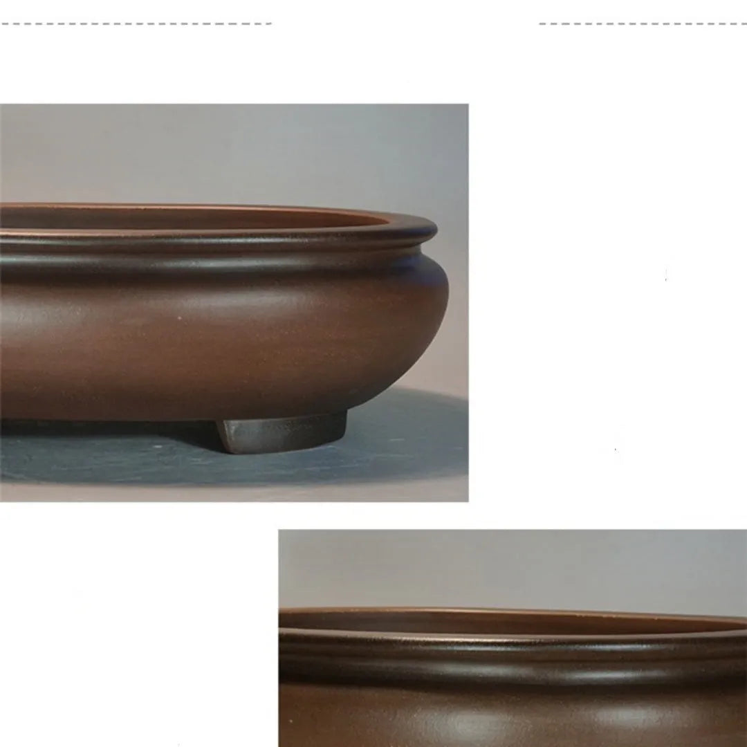 Handmade purple clay classical style desktop flowerpot on a wooden surface