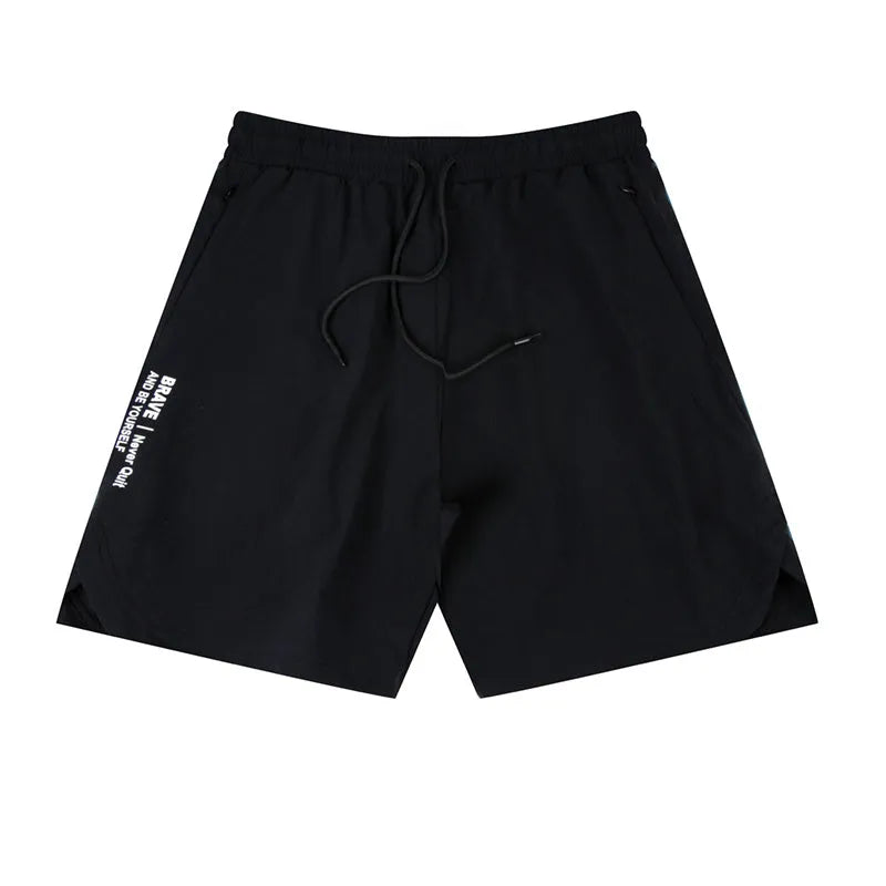 Men's black quick-drying thin running shorts made of nylon and spandex blend on a grey background.