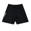 Men's black quick-drying thin running shorts made of nylon and spandex blend on a grey background.