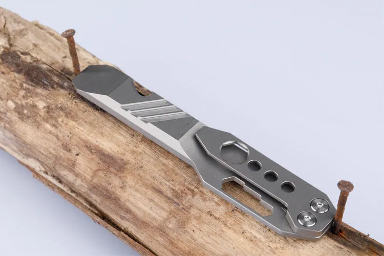Titanium alloy multi-function crowbar tool with bottle opener in gun grey or stone wash finish