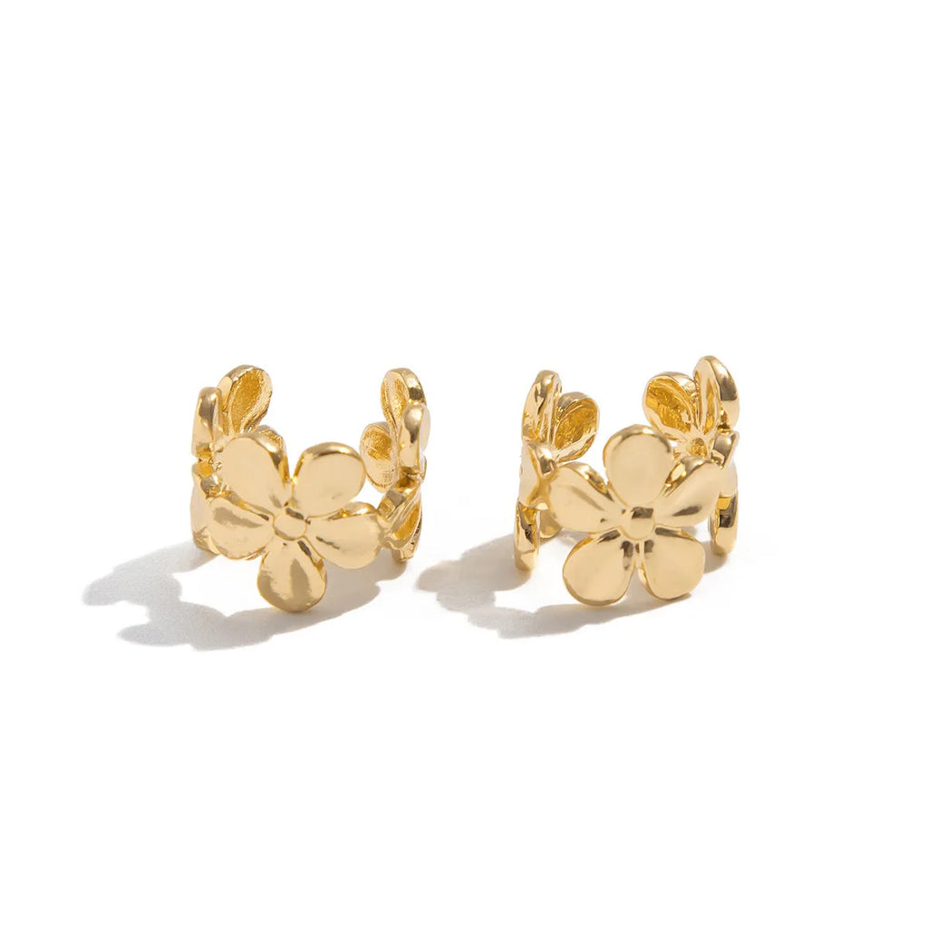 Gold women's drop earrings with a starfish and conch design on alloy hooks.