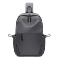 Men's grey waterproof agent chest bag with shoulder strap showing front pocket and large main compartment.