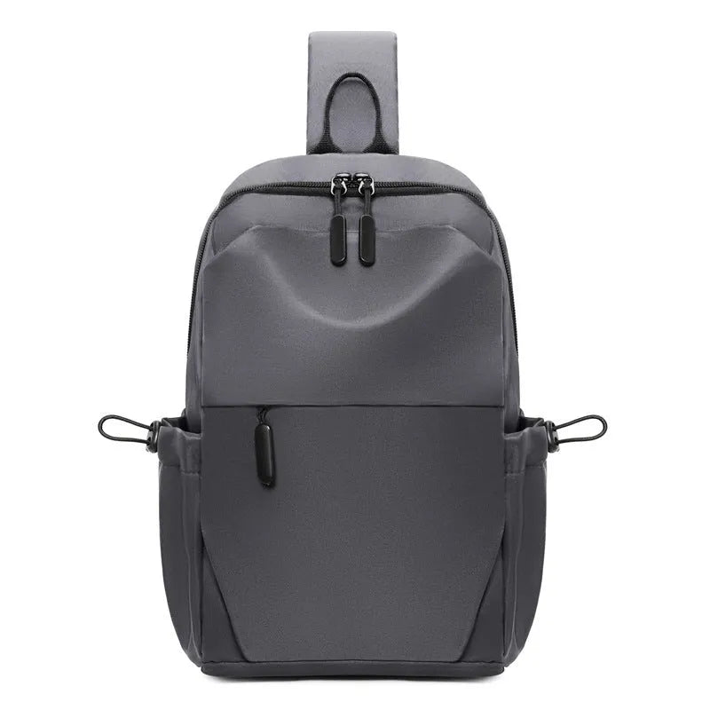 Men's grey waterproof agent chest bag with shoulder strap showing front pocket and large main compartment.