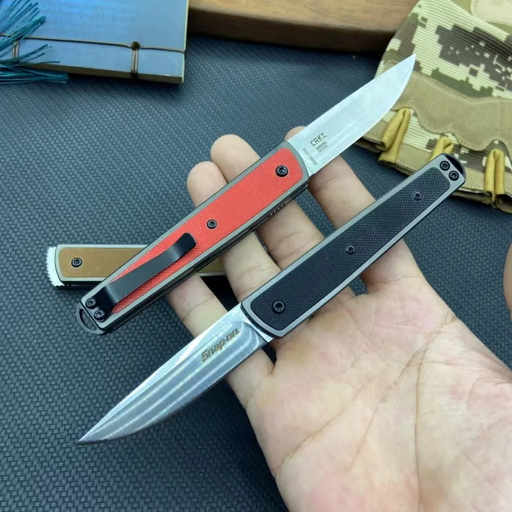 Handmade folding fruit knife with stainless steel blade shown open, in black, red, or brown colour options.