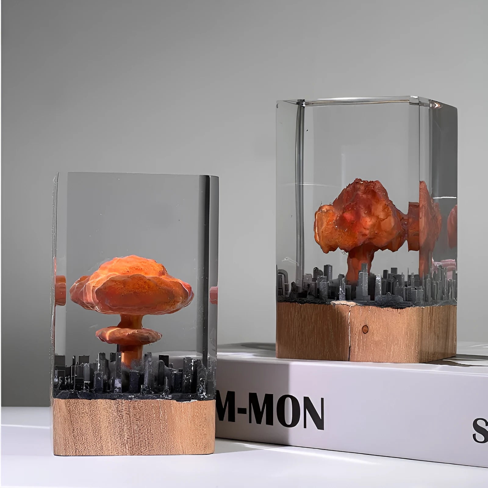 Small resin night lamp shaped like an atomic bomb mushroom cloud in modern simplicity style.