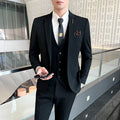 Men's three-piece striped suit set in black, slim fit, with jacket, vest and trousers on a hanger
